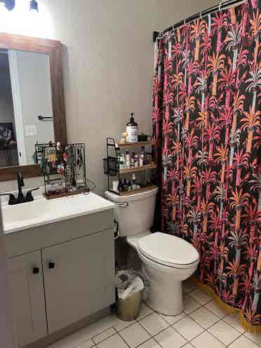 Furnished bedroom with private bath