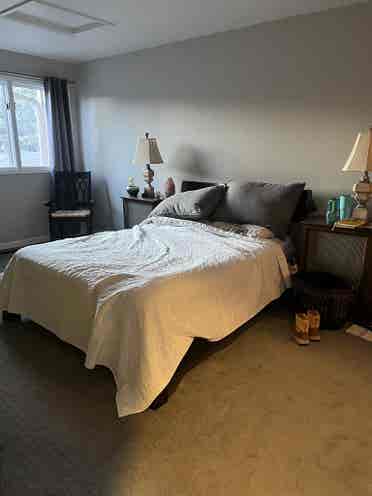 Furnished bedroom with private bath