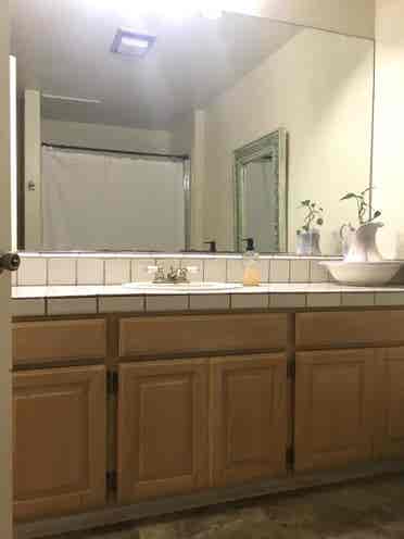 Corner Bedroom: Bright & Furnished
