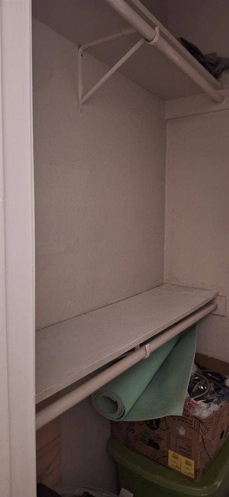 Small room with walkin closet.