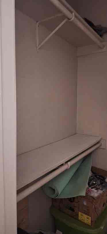 Small room with walkin closet.