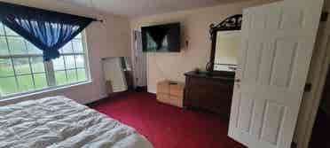 Furnished bedroom private bathroom