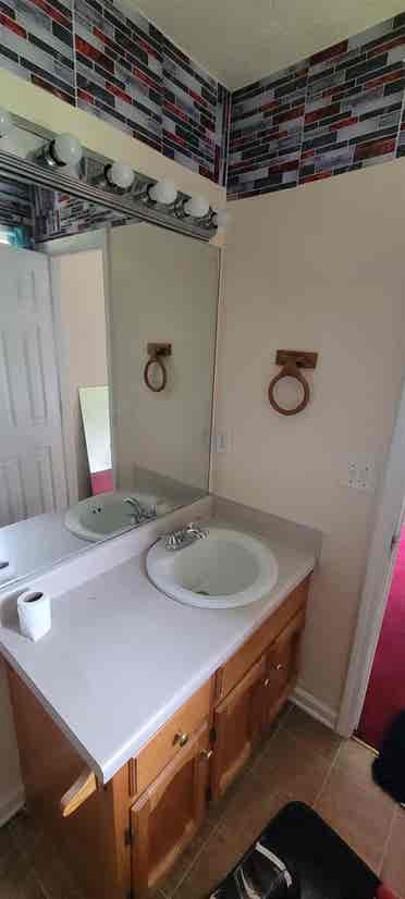 Furnished bedroom private bathroom