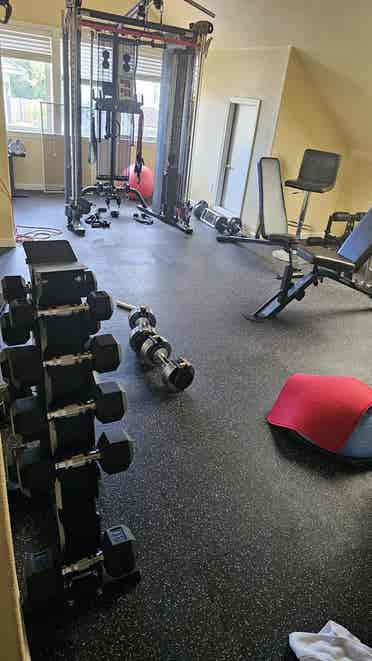 Room overlooking pool w/ home gym!