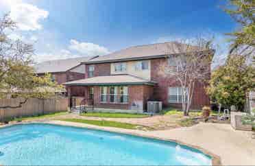 Home in Stone Oak with a pool