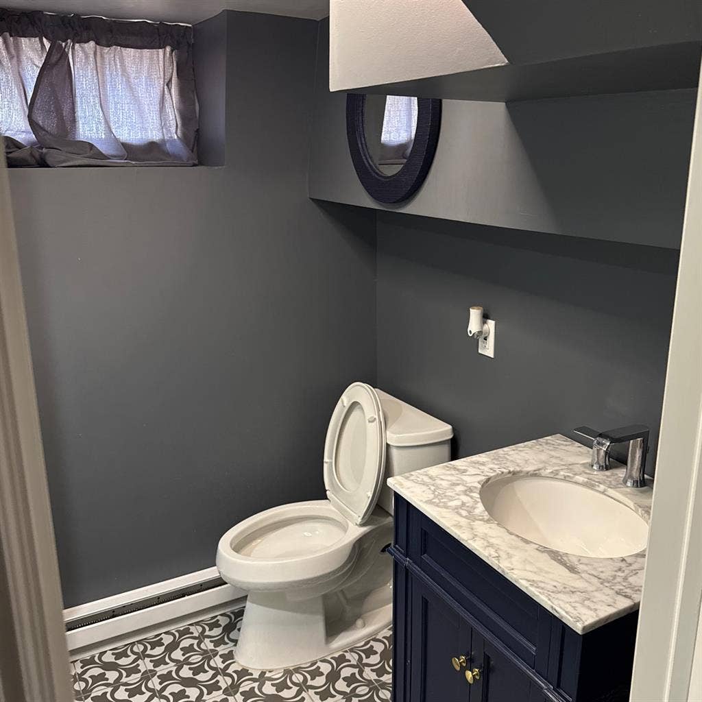 Downstairs room w/ private bathroom