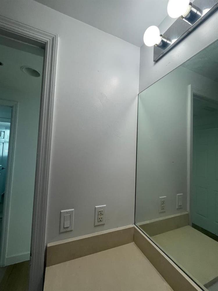Room with  balcony and bathroom