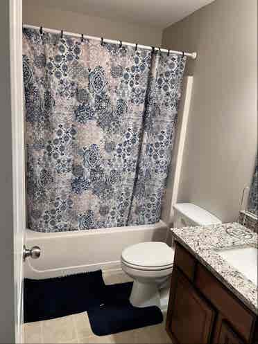 Cozy room with a private bathroom.