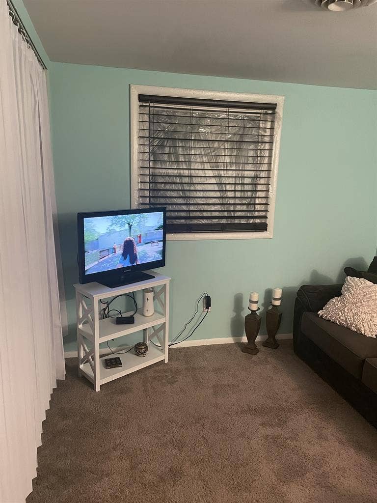 Offering furnished room for rent.