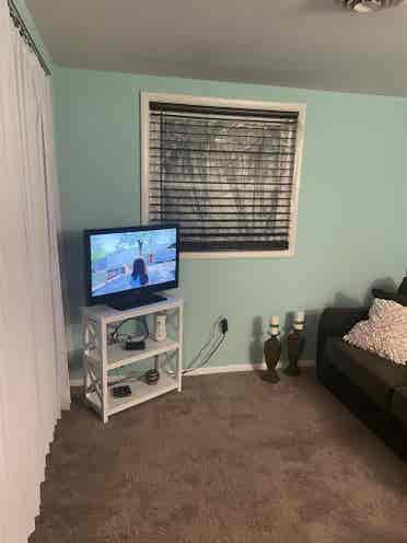 Offering furnished room for rent.
