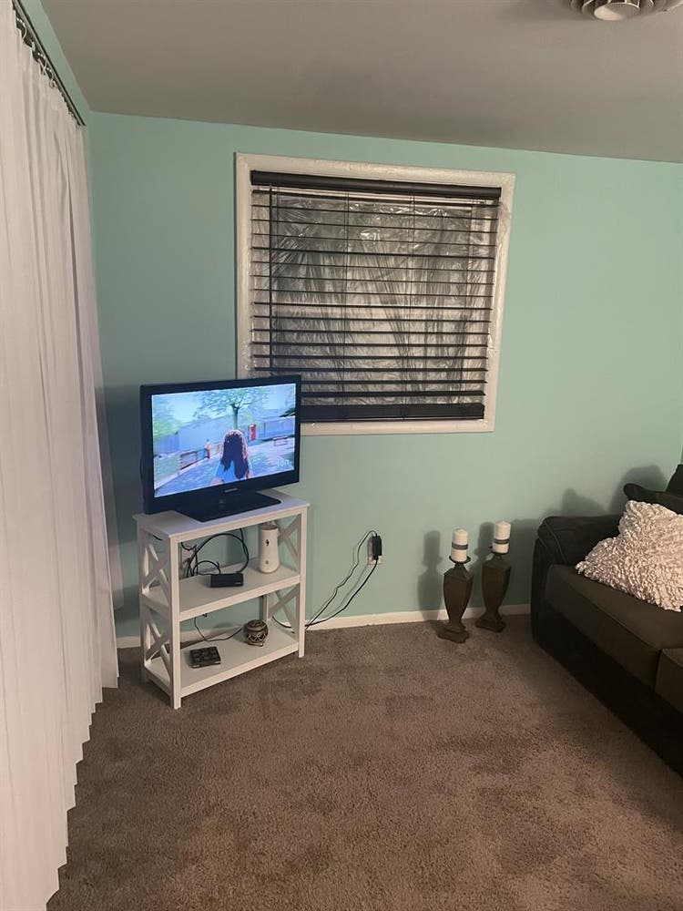 Offering furnished room for rent.
