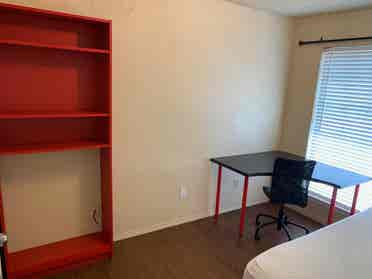 Bedroom in a house with bills paid