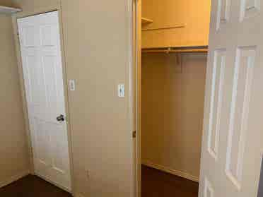 Bedroom in a house with bills paid