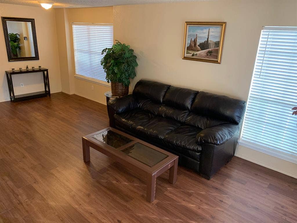 Bedroom in a house with bills paid