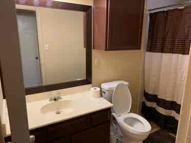 Bedroom in a house with bills paid
