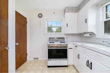 3 bedroom brick Cape Cod