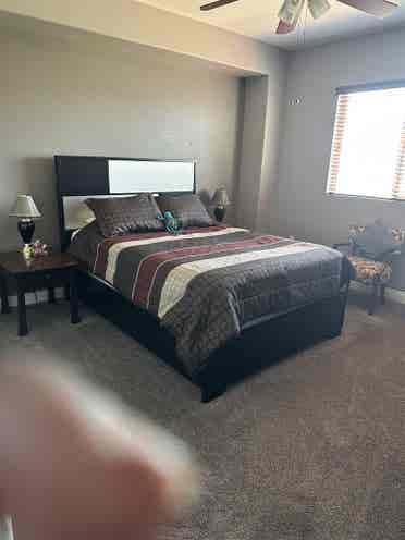 Furnished bedroom with private bath