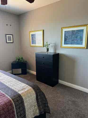 Furnished bedroom with private bath