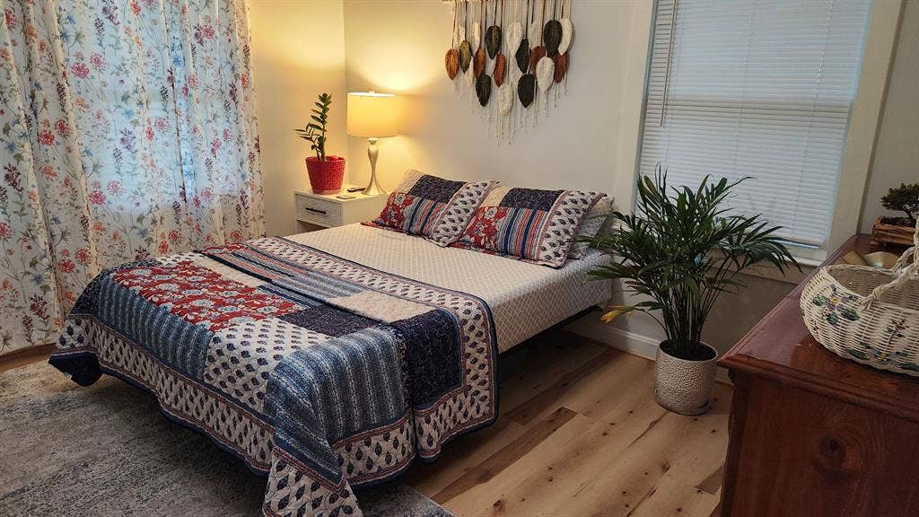 A cozy garden-view bedroom