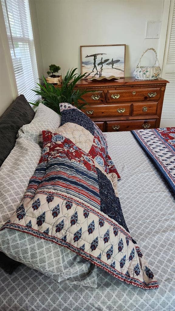 A cozy garden-view bedroom