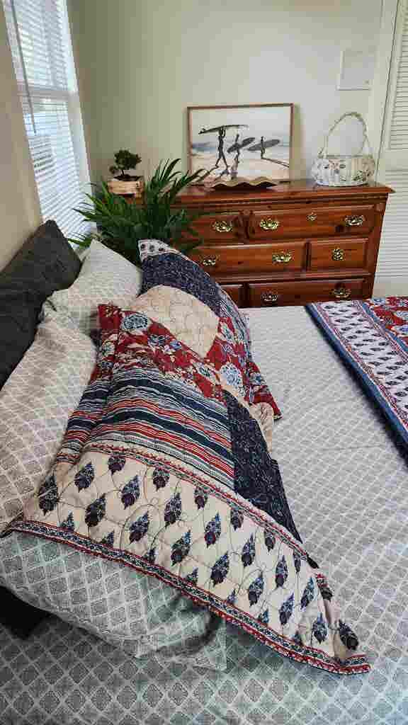 A cozy garden-view bedroom