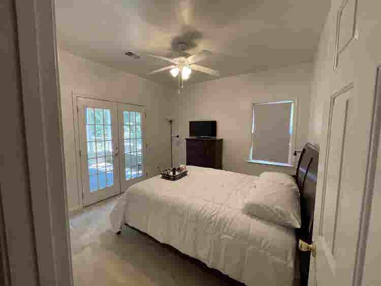 Ranch - Bedroom w/Patio & Gardens