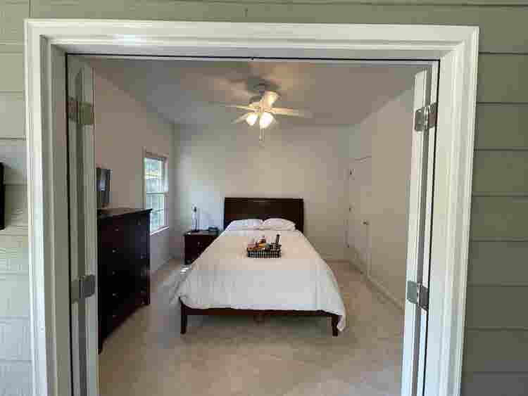 Ranch - Bedroom w/Patio & Gardens