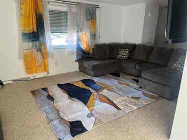 Furnished room with mini fridge