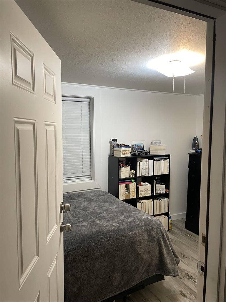 Furnished room with mini fridge