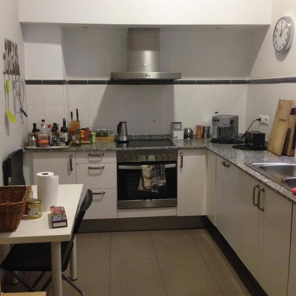 Habitación con balcón en el centro