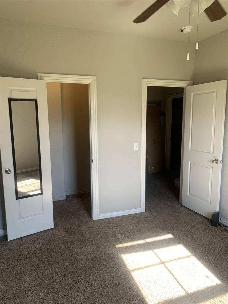Room with amenities in townhouse.