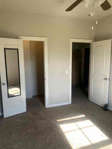 Room with amenities in townhouse.
