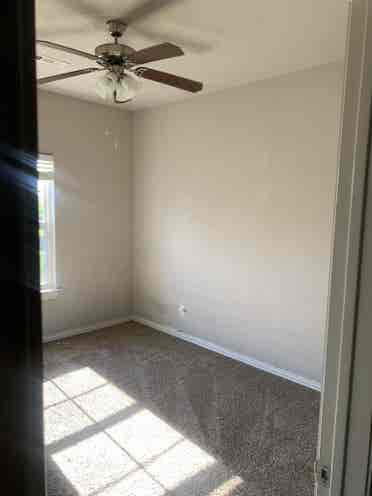 Room with amenities in townhouse.