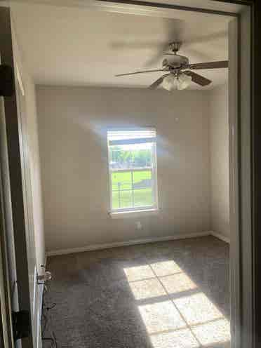 Room with amenities in townhouse.