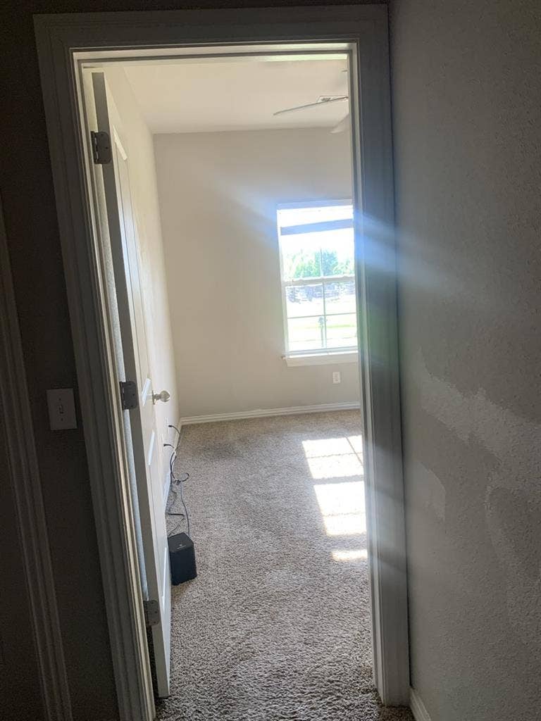 Room with amenities in townhouse.