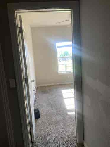 Room with amenities in townhouse.