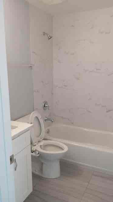 Clean room for rent in quiet condo
