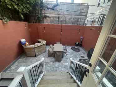 Backyard and close to Domino Park!