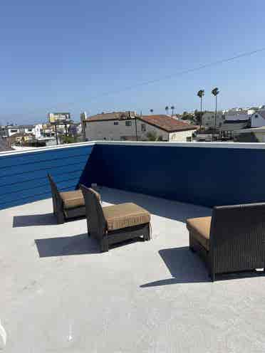 HB studio with deck and ocean views