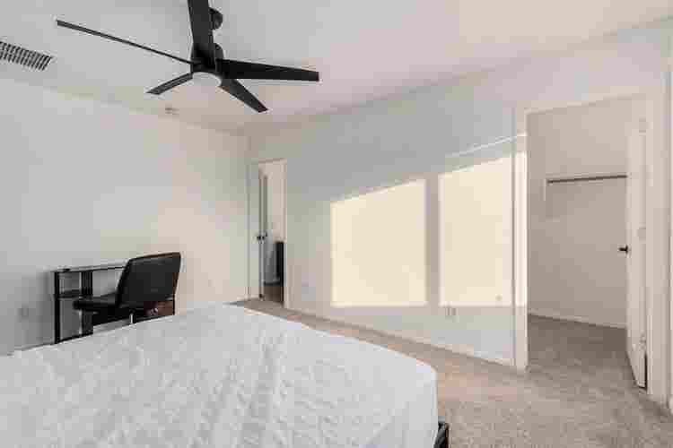 Two story with rooms for rent.