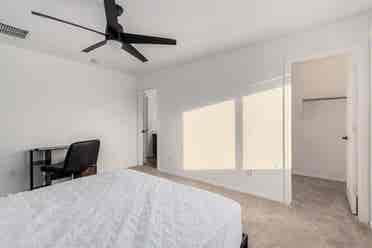 Two story with rooms for rent.