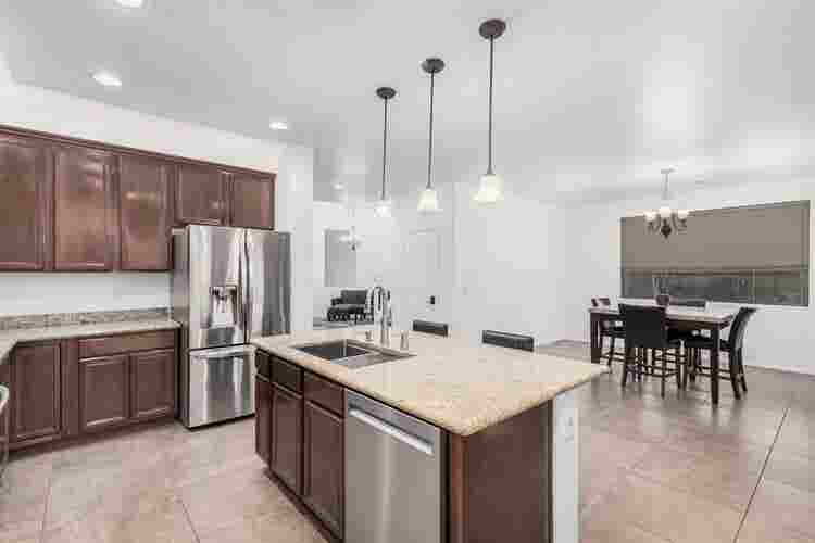 Two story with rooms for rent.