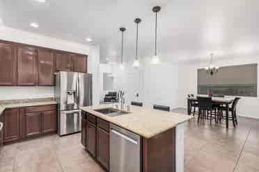 Two story with rooms for rent.