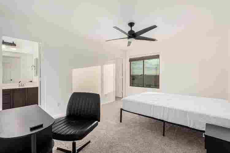 Two story with rooms for rent.
