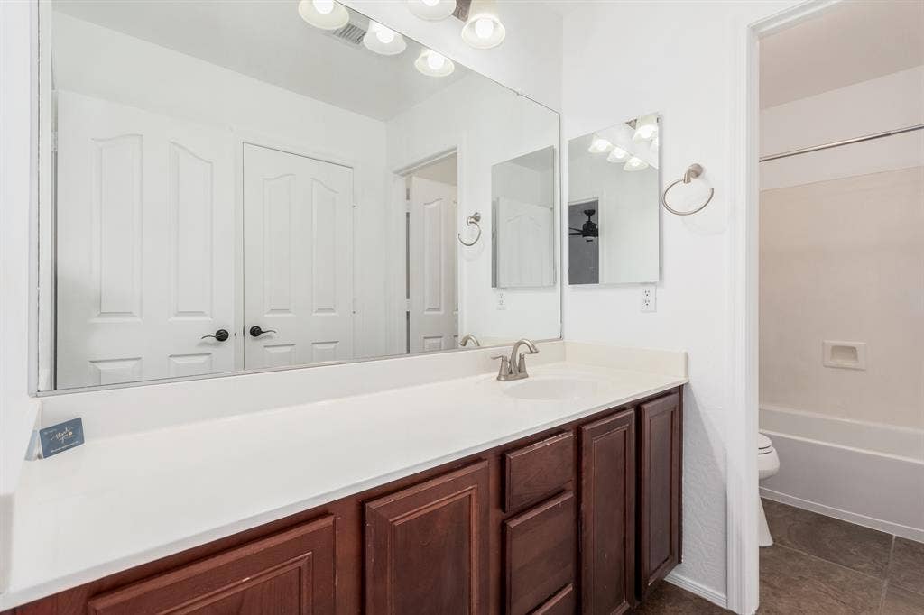 Two story with rooms for rent.