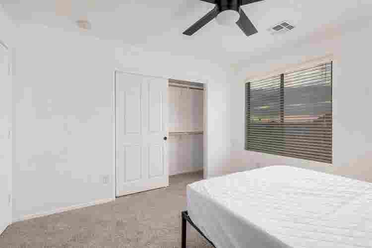 Two story with rooms for rent.