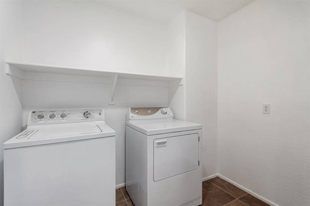 Two story with rooms for rent.