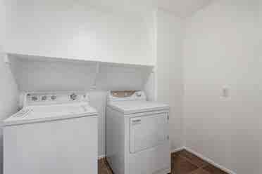 Two story with rooms for rent.