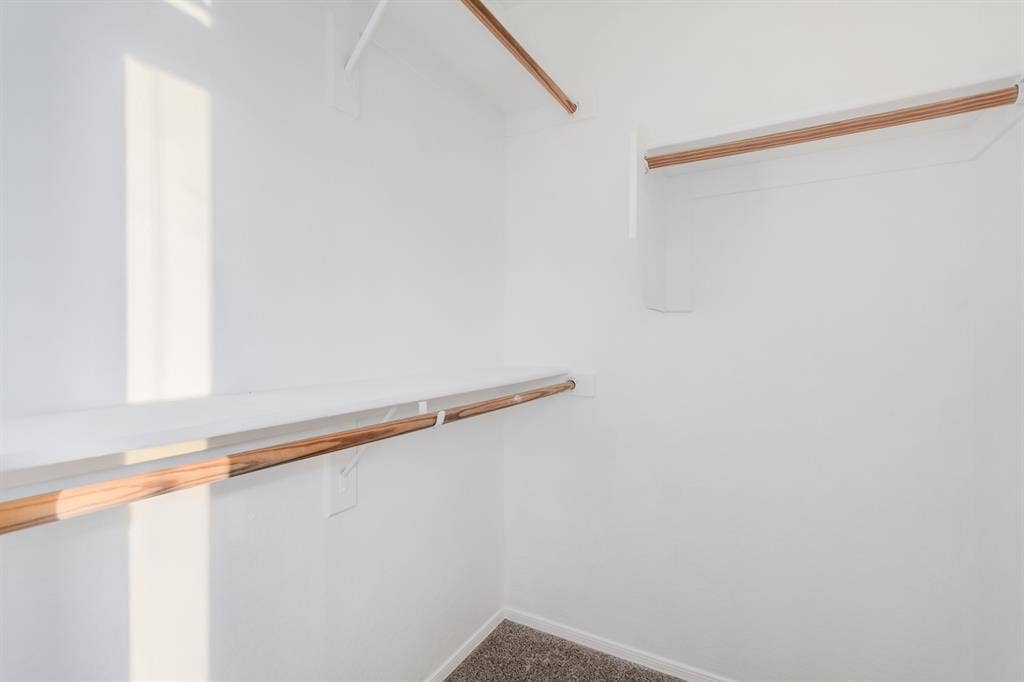 Two story with rooms for rent.