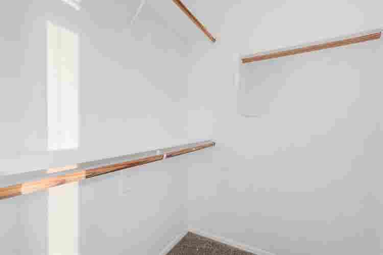 Two story with rooms for rent.